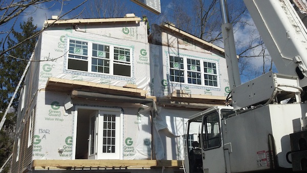 Completing assembling the modules at the Mercer County house