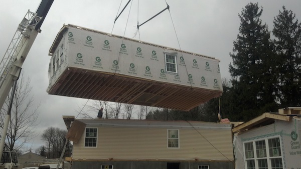 Assembling modules on Mercer County house